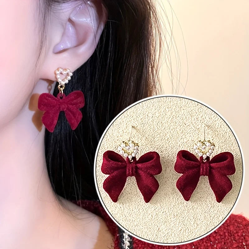 plush bow pearl earrings