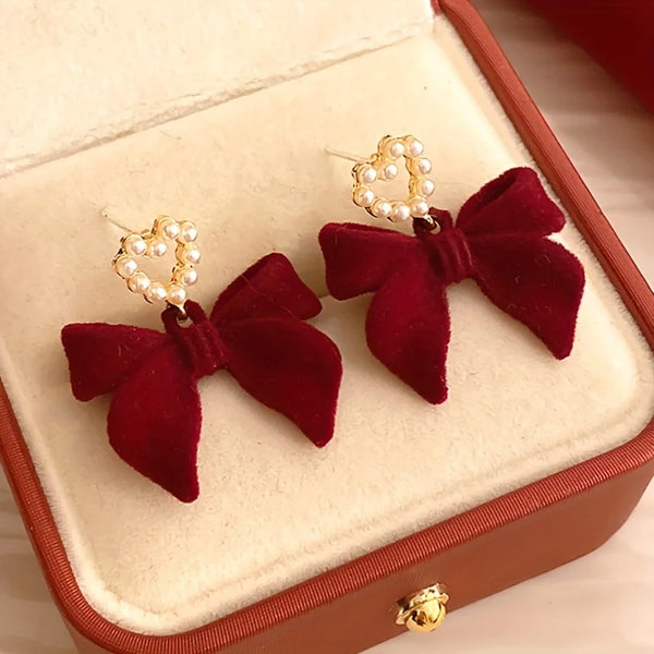 plush bow pearl earrings