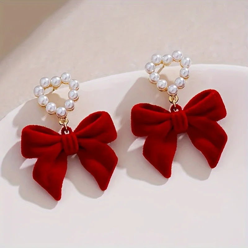 plush bow pearl earrings