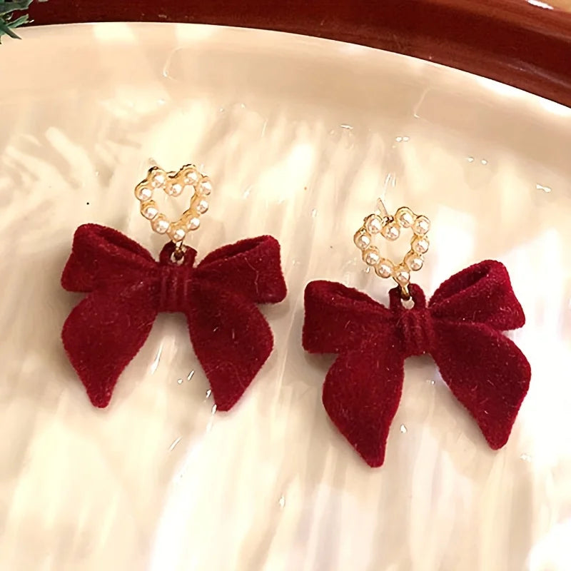 plush bow pearl earrings